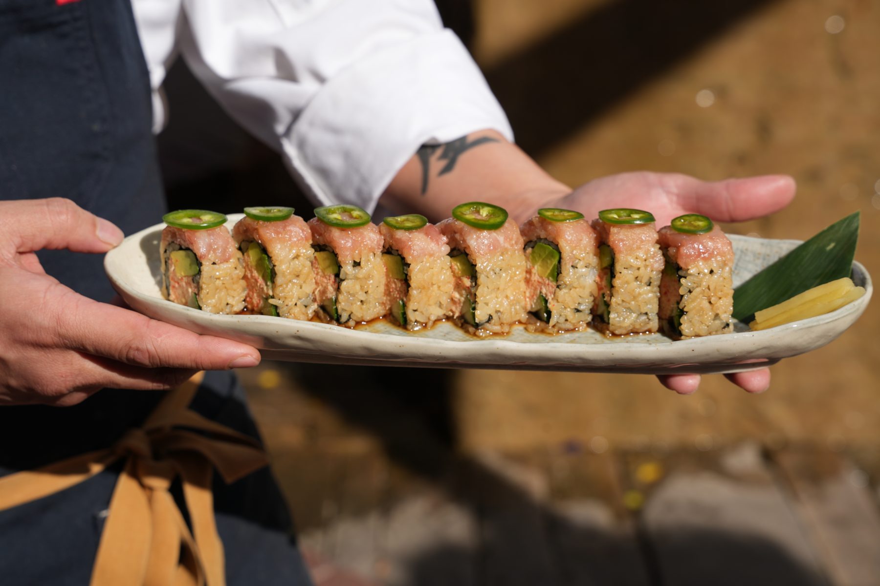 Chef presenting a platter